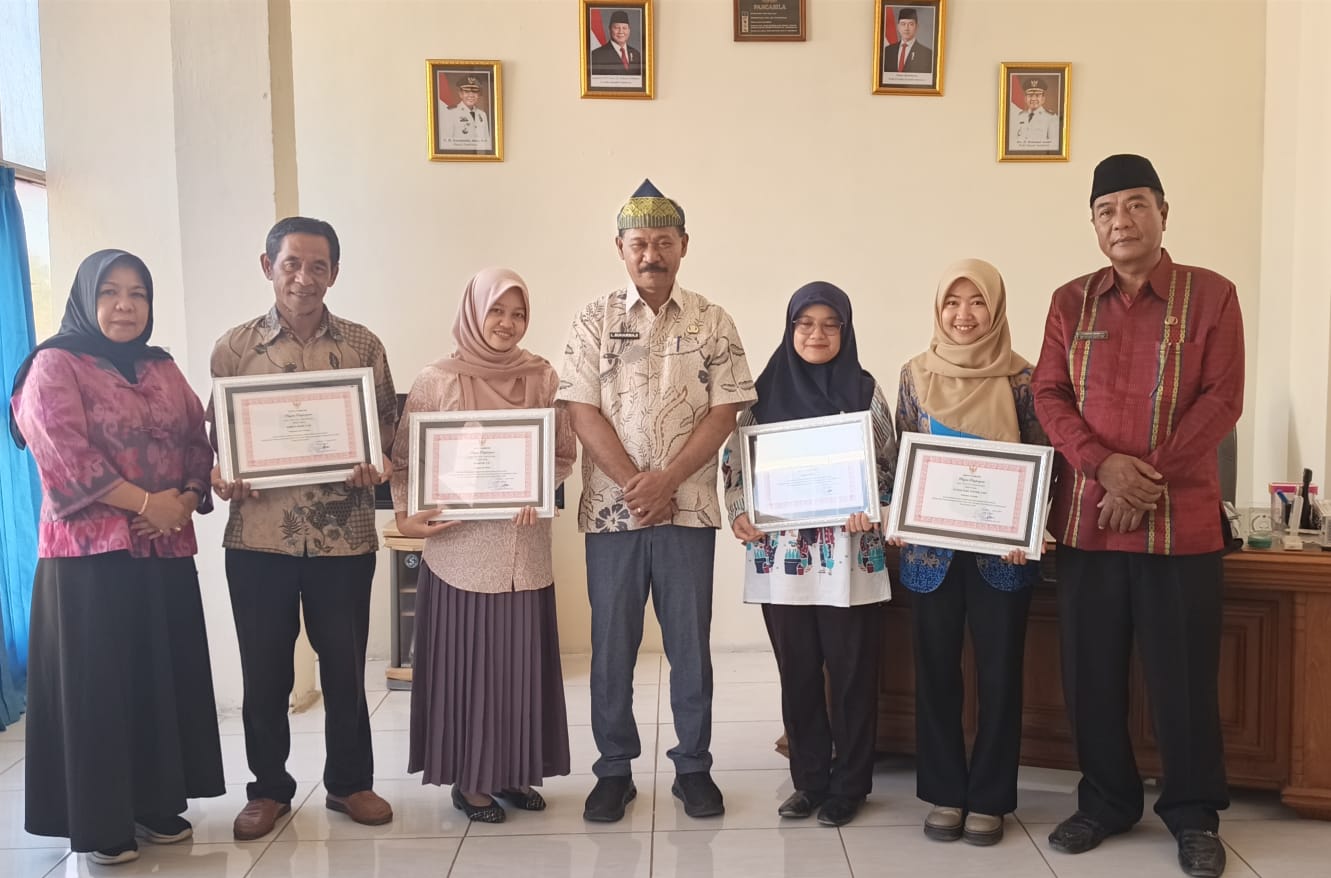 Penyerahan Piagam Penghargaan Kepada Arsiparis Terbaik Tahun 2026